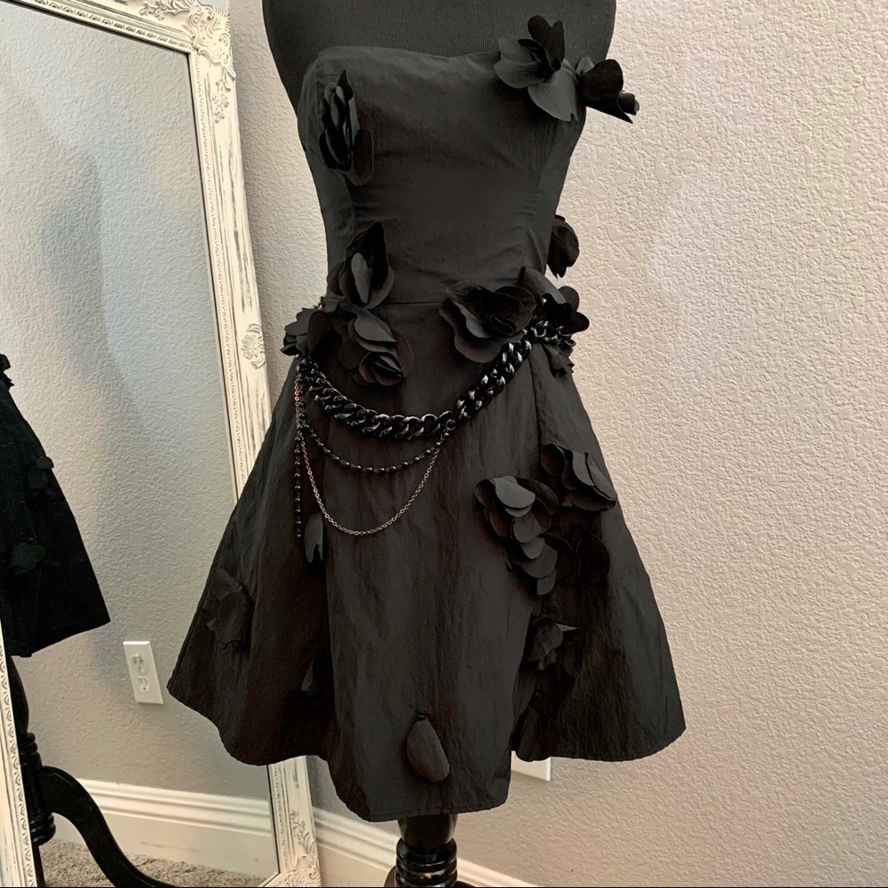 Unique Black Bebe Floral Party Dress with a chain